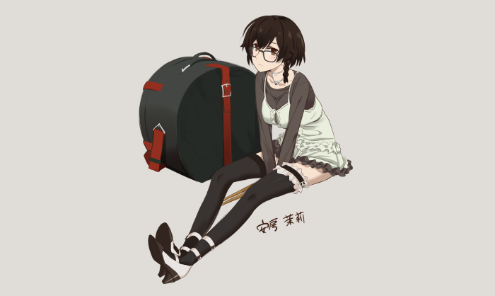 Girl with glasses and a large bag