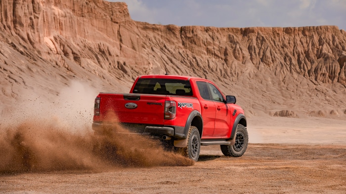 Red Ford Ranger Raptor driving in desert 4K