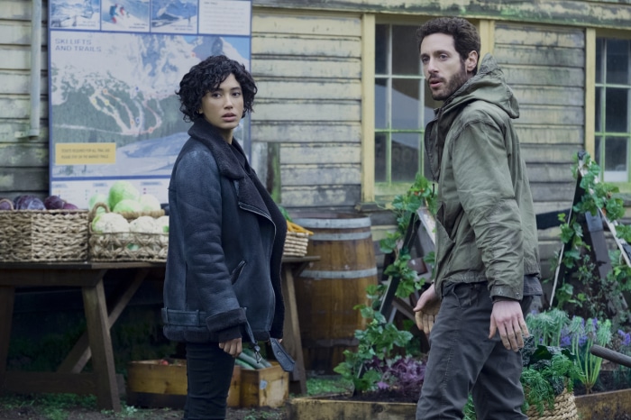 Andy Allo and man in green jacket