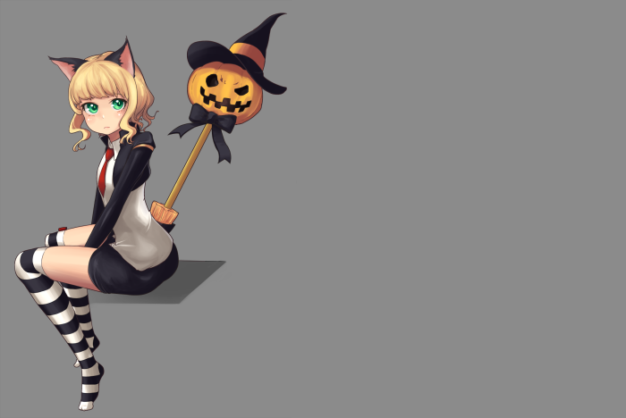 Girl with cat ears and pumpkin staff
