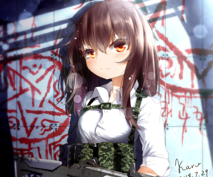 Girl with gun and graffiti wall