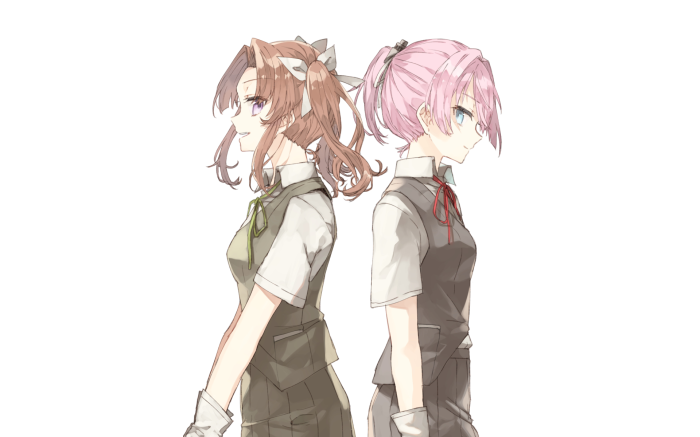 Two girls in school uniforms standing back to back