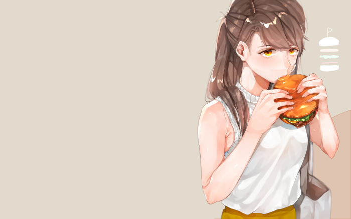 Girl eating a hamburger