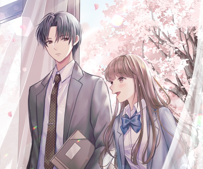 Couple walking under cherry blossoms