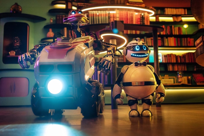 Two robots in a library