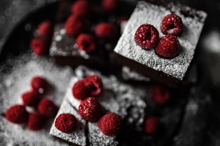 Brownies with Raspberries and Powdered Sugar 4K
