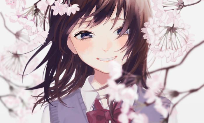 Girl smiling among cherry blossoms