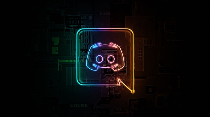 Discord logo with neon outline on circuit board