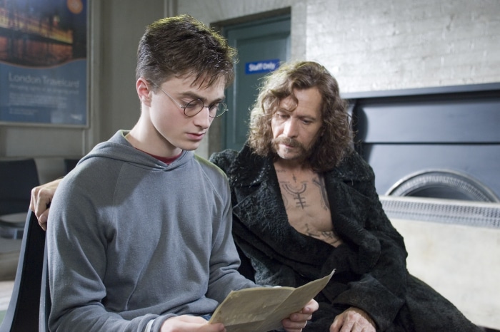 Sirius Black and Harry Potter at a train station