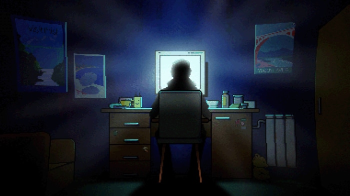 Person at computer at night