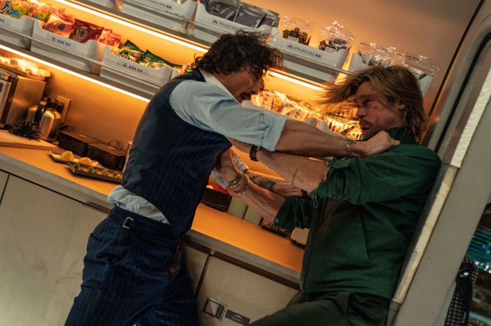 Brad Pitt and Aaron Taylor-Johnson fighting on Bullet Train