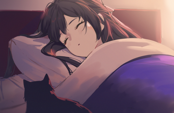 Girl sleeping with a cat