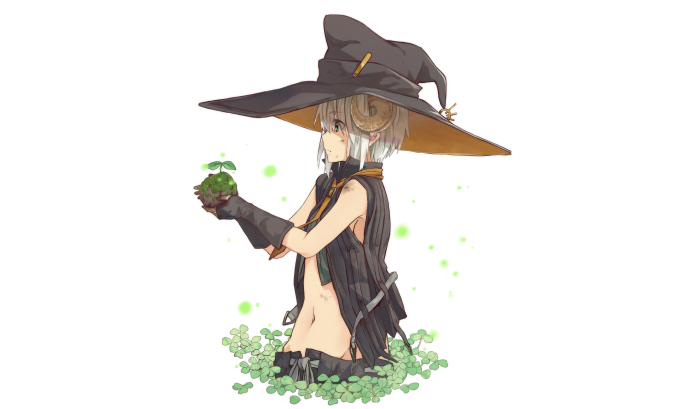 Witch holding a plant with clover
