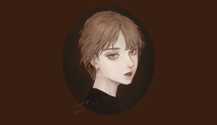 Portrait of a young woman with short brown hair
