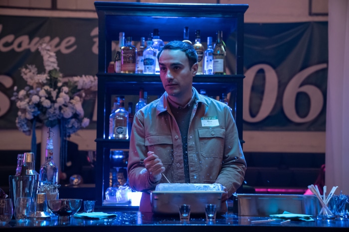 Man preparing drinks at a bar in The Afterparty 4K