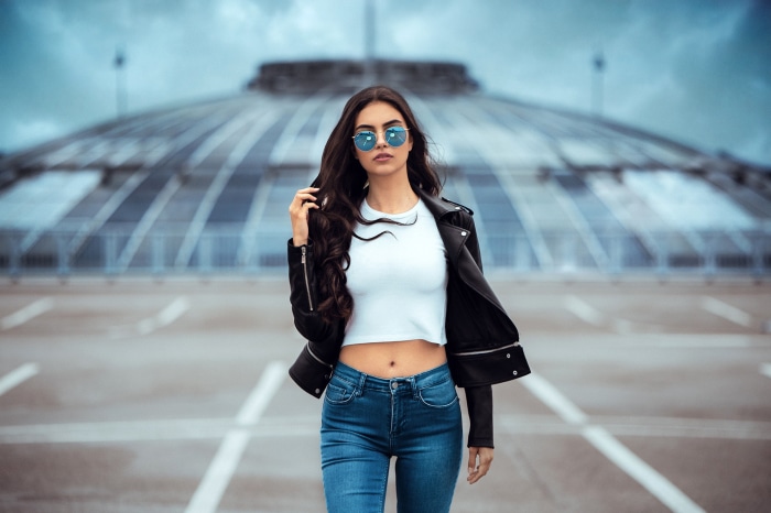 Woman in leather jacket and sunglasses