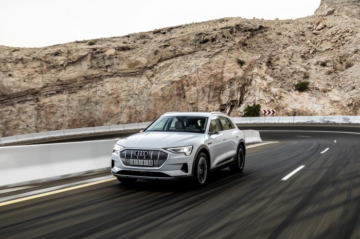 White Audi E-Tron SUV on a Mountain Road