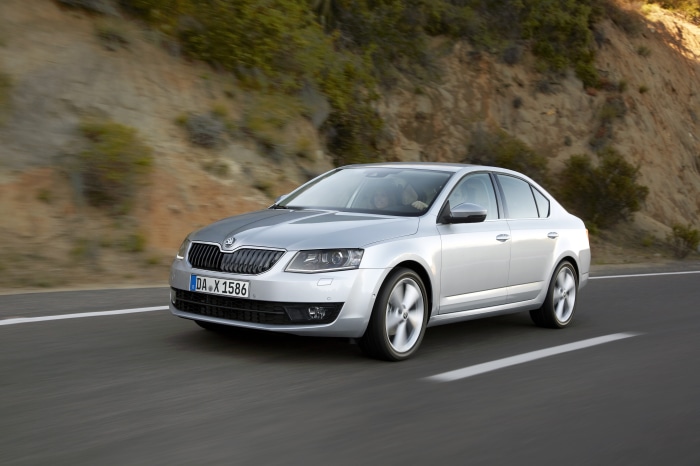 Silver Skoda Octavia 4K driving on a road