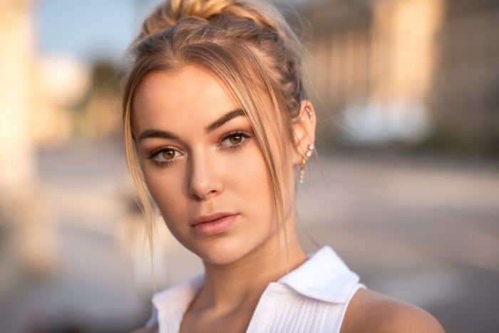 Woman with blonde hair in a bun