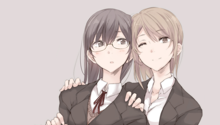Two girls in school uniforms