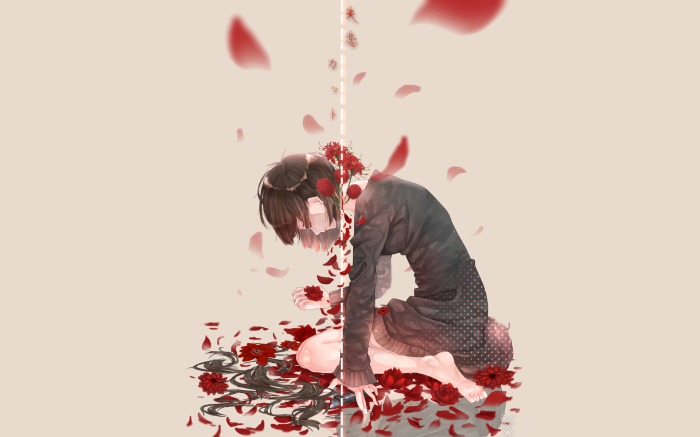Girl surrounded by red flowers and petals