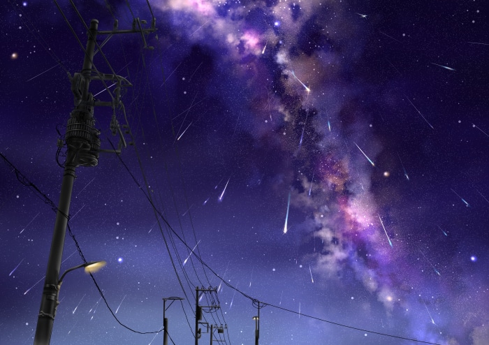 Night sky with shooting stars and power lines