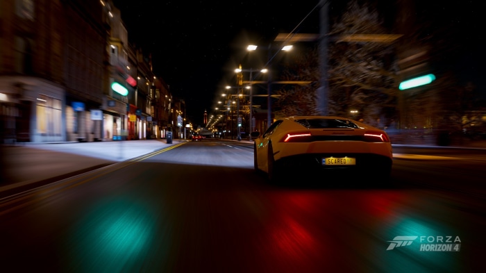 Yellow Lamborghini driving at night in Forza Horizon 4