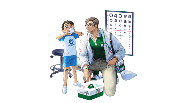 Doctor and child at eye exam chart