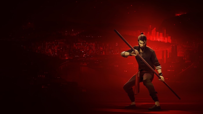 Man with staff in front of city skyline