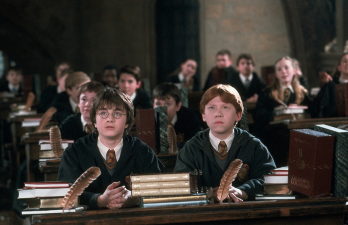 Harry Potter and Ron Weasley in a classroom