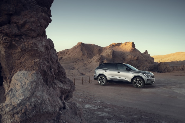 Renault Austral E-TECH Hybrid SUV in desert landscape
