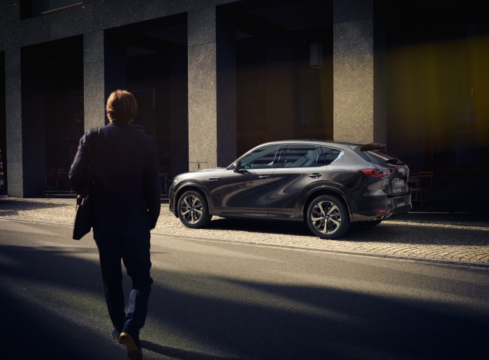Mazda CX-60 Takumi SUV on a city street