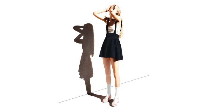 Woman in black skirt and white top with shadow