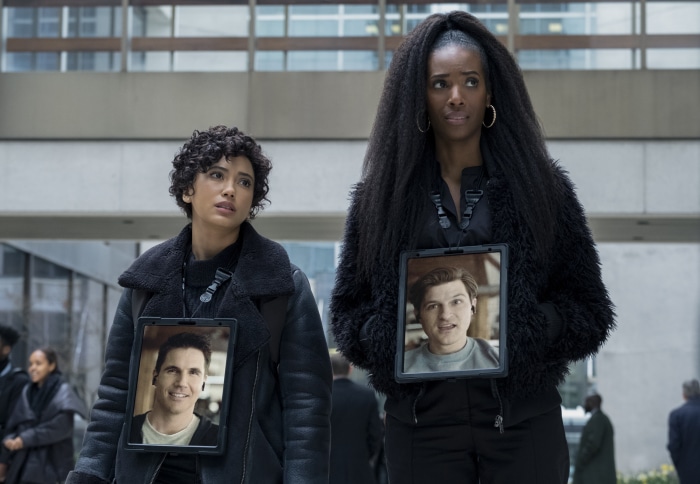 Andy Allo and other characters with screens