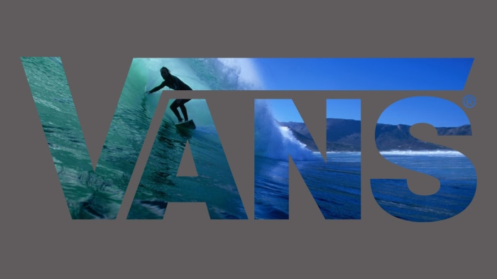 Vans logo with surfing imagery