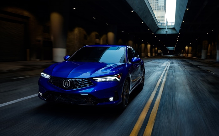 Blue Acura Integra Driving Through Tunnel
