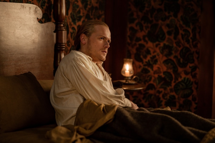 Jamie Fraser from Outlander in bed