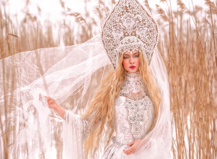 Model in traditional Russian attire with veil