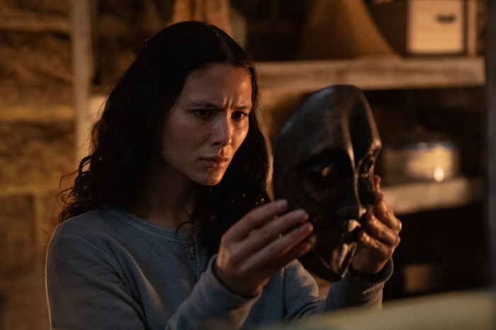 Fivel Stewart holding a mask