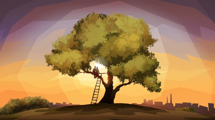 Couple sitting on a tree branch at sunset