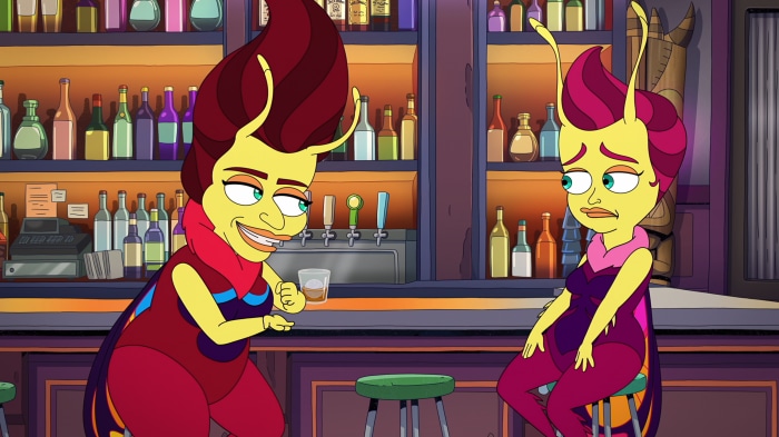 Two characters at a bar
