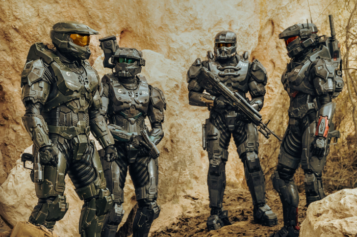 Four Spartans from Halo in a rocky landscape