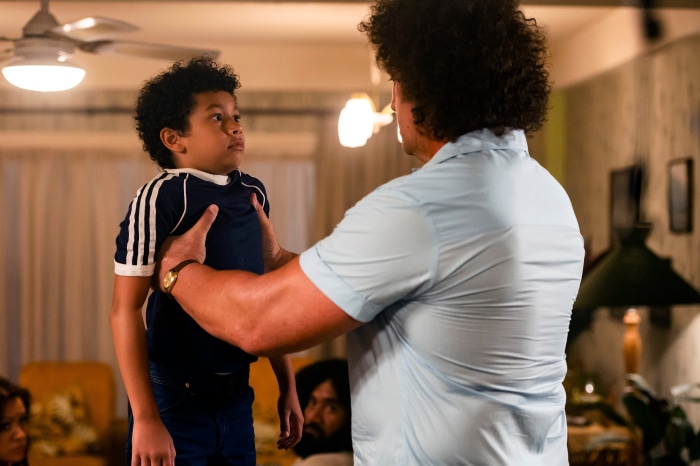 Dwayne Johnson and child actor from Young Rock