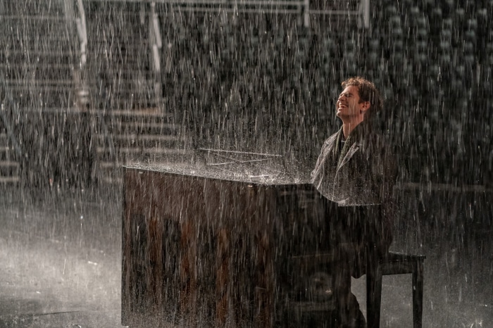 Andrew Garfield in Tick, Tick...BOOM! during rain
