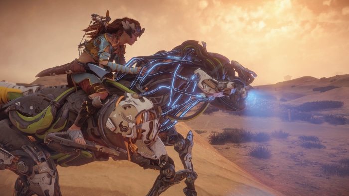 Aloy riding a mechanical creature in Horizon