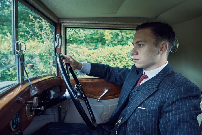 Arthur Shelby from Peaky Blinders driving a car