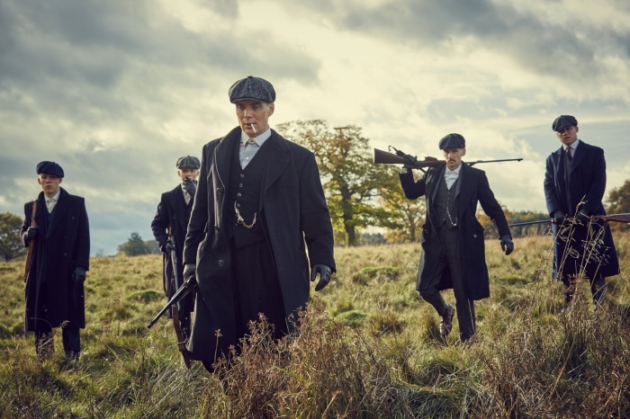 Thomas Shelby and men from Peaky Blinders in a field