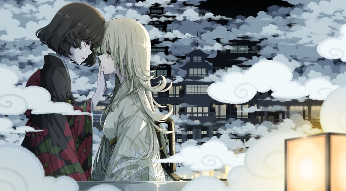 Two women in kimonos in front of a traditional Japanese building