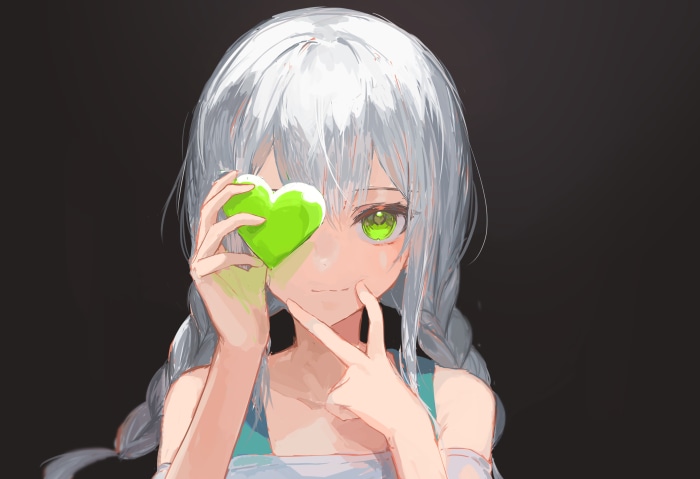 Girl with grey hair holding a green heart
