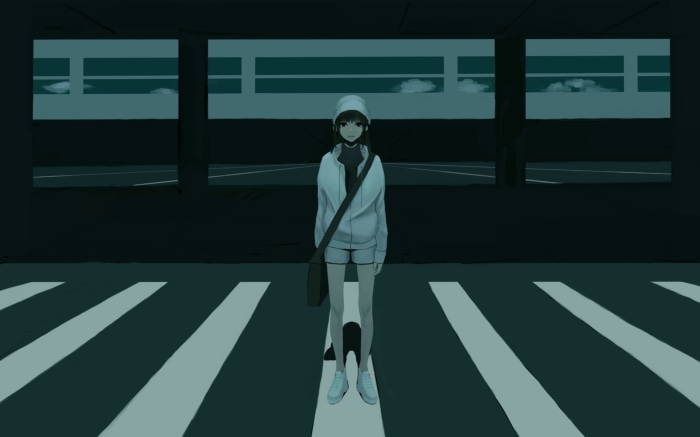 Girl standing on a crosswalk